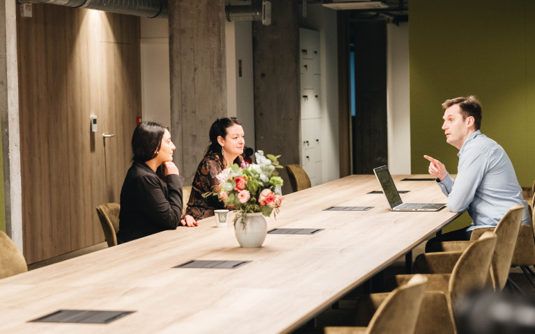 Three people meeting